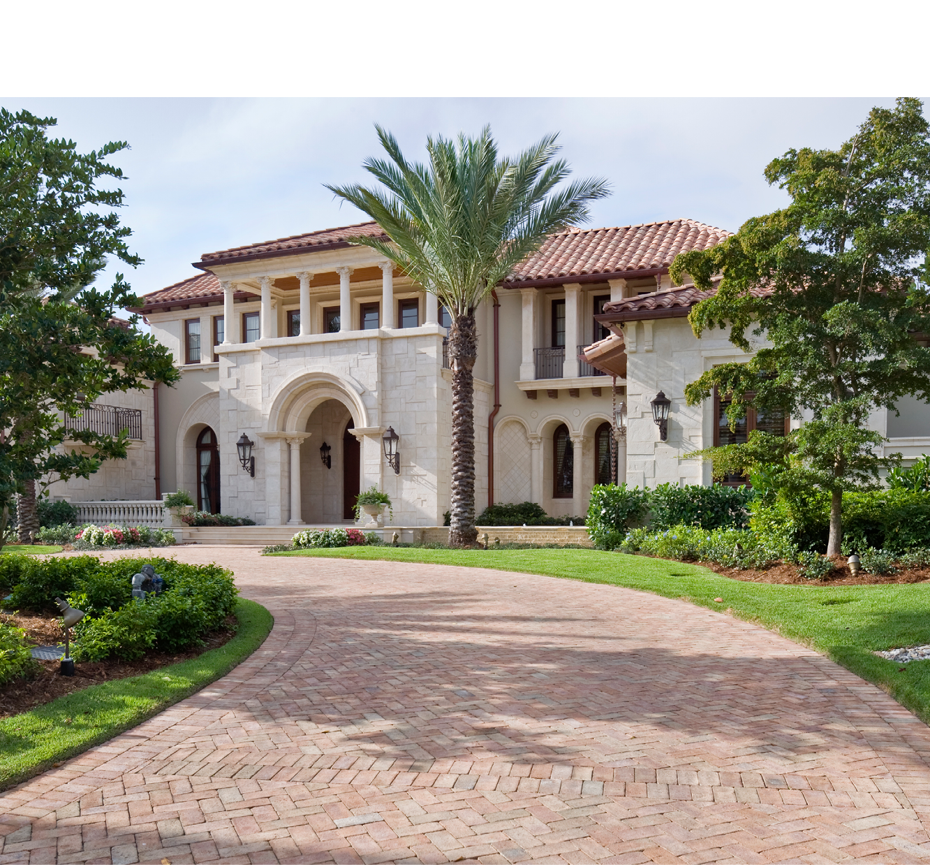 Brick pavers leading up to this beautiful estate home in Florida.